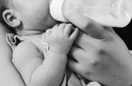 infant drinking an emergency baby formula alternative