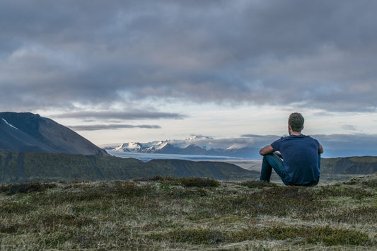 man overlooking mountain