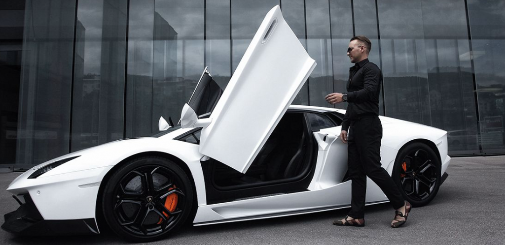 guy getting into a white lambo

